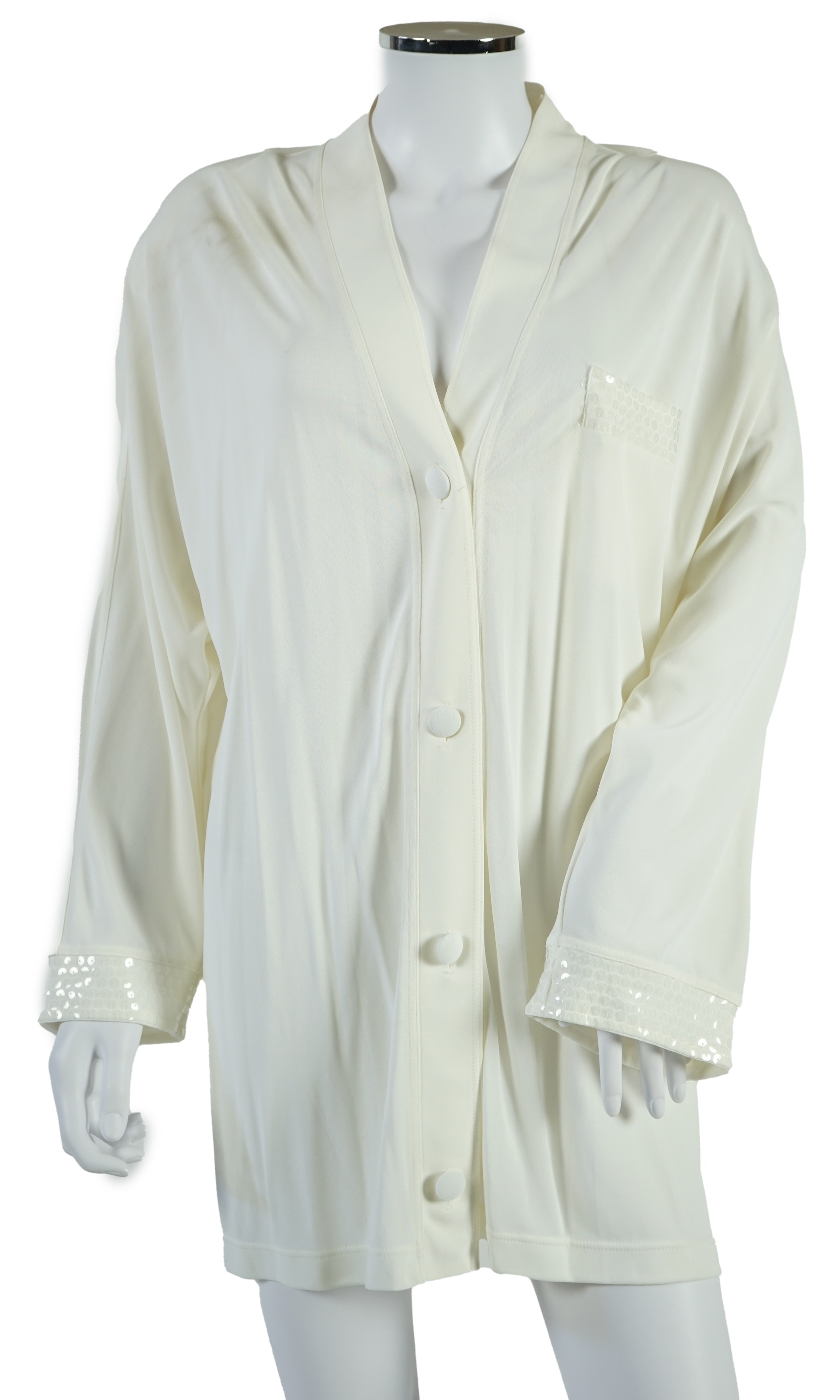 A La Perla white trouser lounge suit, a black jacket lounge jacket, a fawn silk dress and a white embroidered shirt dress. Approx Size L Proceeds to Happy Paws Puppy Rescue